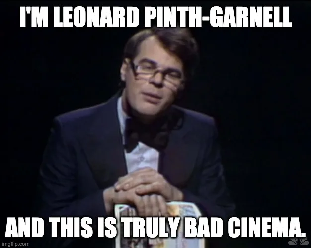 A man in a tuxedo with glasses, hands clasped, looks down with a resigned expression. White bold text at the top reads 'I'M…
