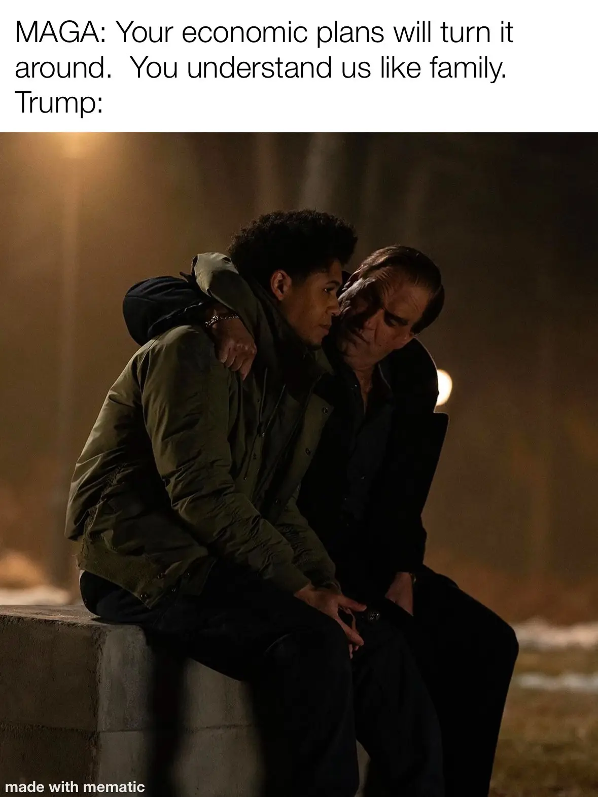 Two men sit on a concrete ledge at night, one in a green jacket with his arm around the other in a black coat. The text…