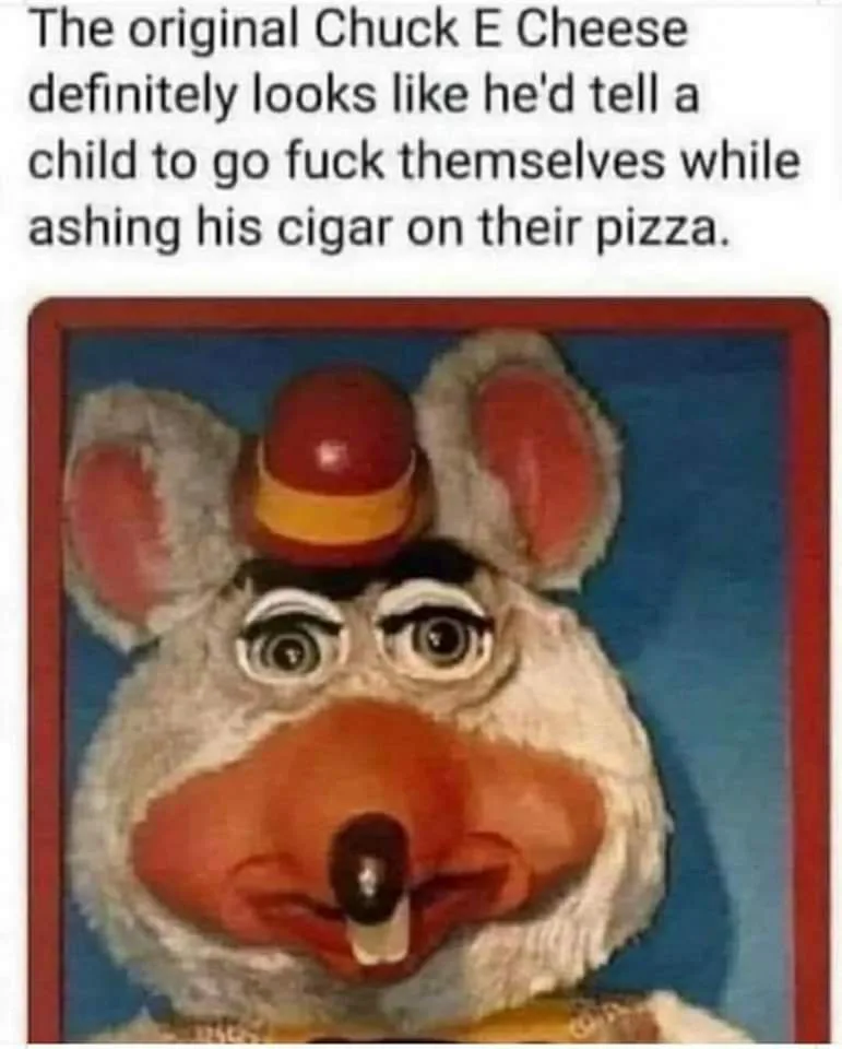 The image shows a close-up of the original Chuck E. Cheese mascot, a mouse puppet with a red and yellow hat, wide eyes, and…