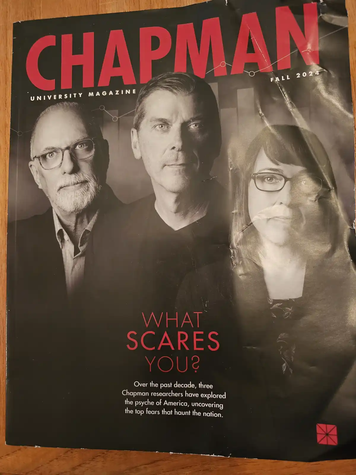 The cover of Chapman University Magazine, Fall 2024, features three researchers with serious expressions. The headline reads…