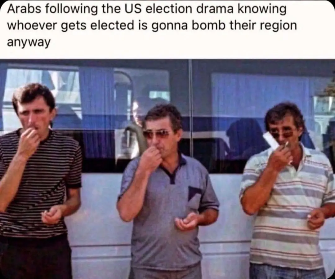 Three men stand side by side, each holding a cigarette to their lips with a bored or disinterested expression. They are…