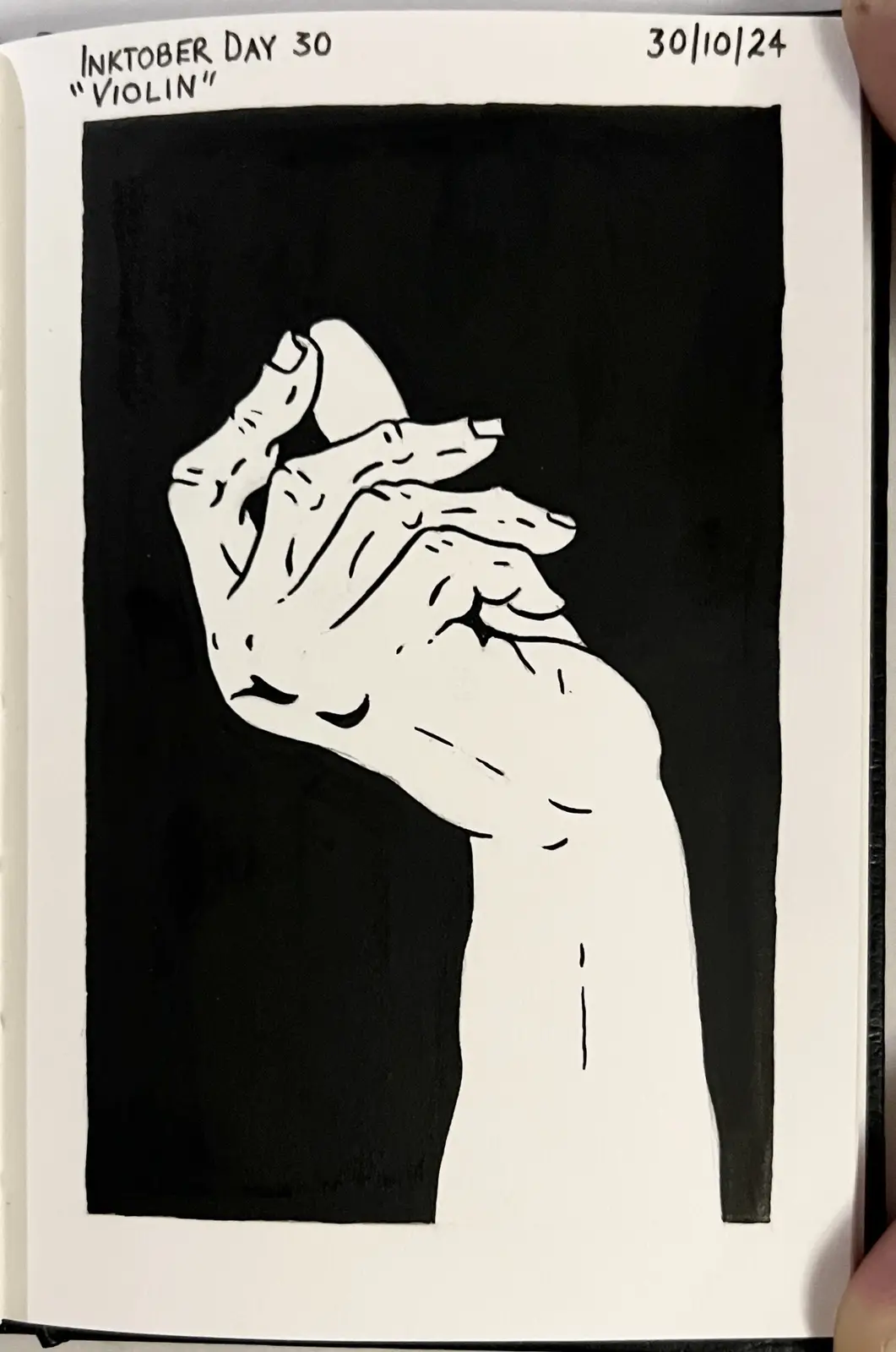 A black and white ink drawing in a sketchbook shows a hand holding a violin bow, with the text 'Inktober Day 30 "VIOLIN"'…