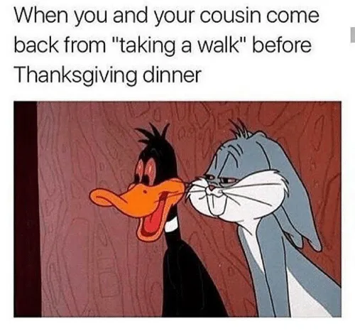 The image shows two cartoon characters, Daffy Duck and Bugs Bunny, standing close together. Daffy Duck has a wide, excited…